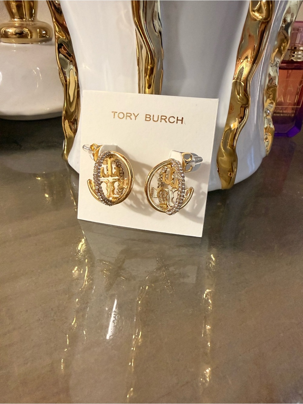 Tory Burch Gold Logo Crisscrossed Hoop Earrings with Rhinestones